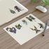 A sheet of fantasy character art prints or stickers featuring eight distinct gothic and horror-themed illustrated figures on a wooden background.